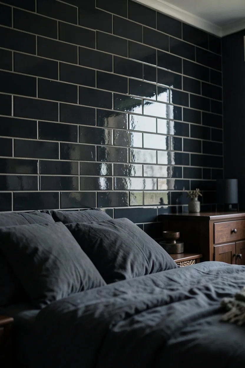 Boho bedroom with tufted deep charcoal velvet bench at foot of bed, decorative throw draped over it, on natural jute rug